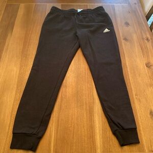 Black adidas women’s sweats with cuffs - M